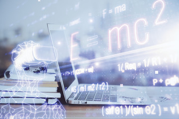 Desktop computer background and formula hologram writing. Double exposure. Education concept.