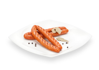 Delicious Crispy Chicken sausages grilled with dried laurel and pepper