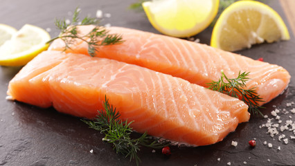 raw salmon fish fillet and lemon