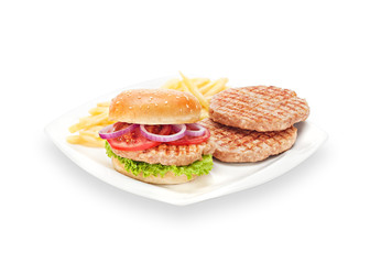 Delicious Homemade hamburger grilled with french fries and fresh vegetable