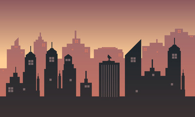 Obraz premium City silhouette against the background of the sky at sunset