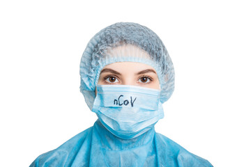 Portrait of young woman wearing medical uniform and mask with nCoV text isolated on white background. Protect your health. Coronavirus concept