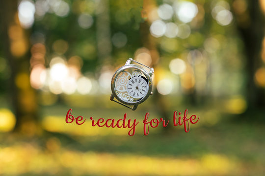 motivator concept wallpaper picture Be ready for life text text vintage hand clock symbolizing new beginning and start on blurred unfocused nature bokeh background