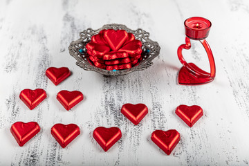 Valentine's Day heart- shaped chocolate candies. love concept for valentines day with sweet and...