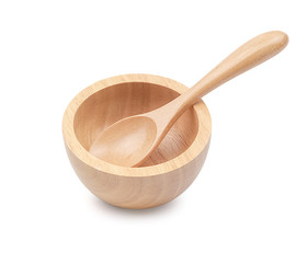Wooden bowl and wooden spoon isolated on white background with clipping path.