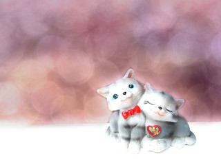 valentine's day card with cats couple toys on bokeh background