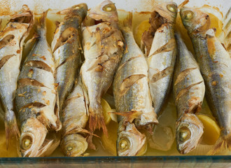 Fototapeta premium Grilled healthy fish near plan shot