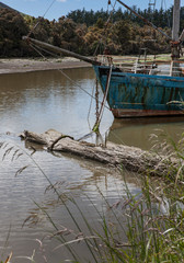 Owaka Catlins New Zealand. Abandoned boat. Ship at Catlins river
