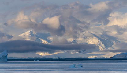 Sunset over the Stunning icy landscapes, Chiriguano Bay, Danko Island, Antarctic Peninsula,...