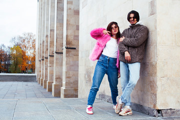 young happy students teenagers at university building on stairs, lifestyle people concept boy and girl