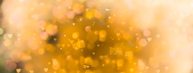 abstract yellow background with bokeh lights  and many - hearts   - Love  - spring, summer, easter