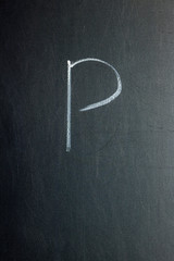 Fototapeta na wymiar Letter P on a chalk board