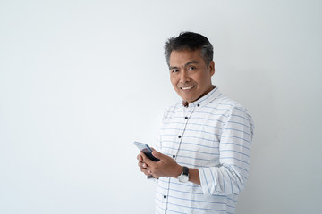 portrait of indonesian mature asian businessman smiling