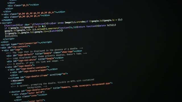 Scrolling html code on the laptop screen.