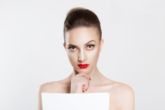 Skeptical about new contract. Actress bride beauty woman looking at you camera thinking analyzing holding paper document prenuptial marital contract tax papers newspaper isolated white background wall