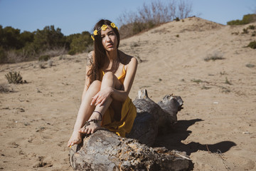 Attractive girl in the yellow dress