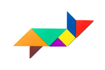 Color wood tangram puzzle in fish or shark shape on white background
