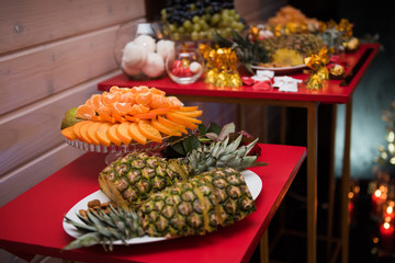 Fruits and sweets on the table