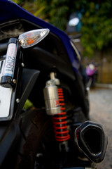 A ticket for passing a technical inspection on a Thai scooter.