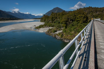 Road to Jackson bay. Westcoast New Zealand. Bridge Okuru river. 
