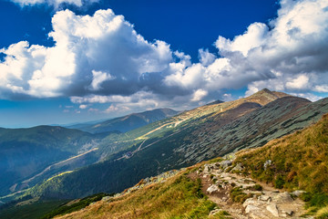 Naklejka premium Mountainous landscape with hills and valleys at a sunny day in autumn season. The Low Tatras National Park in Slovakia, Europe.