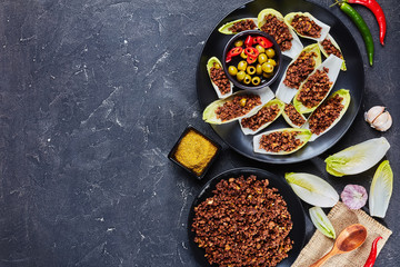 Endive Boats with beef ragout, flat lay