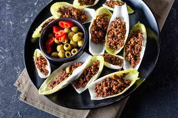 Endive Boats with beef ragout, close up