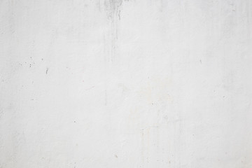 Blank concrete white rough wall for background. Beautiful white wall with cracks and dirty.