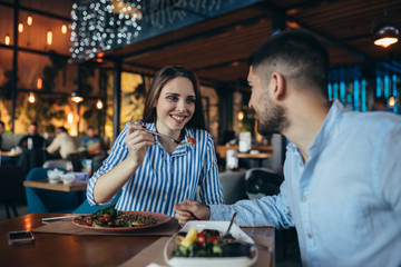 friends having lunch break in restaurant