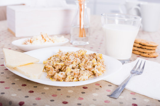 still life of milk, biscuits, porridge from cereals