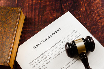 Service agreement with abusive clauses brought to court in a lawsuit.