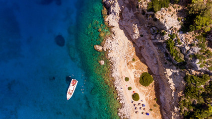 Aerial view on the boat sailing at sea. Summer vacation concept.