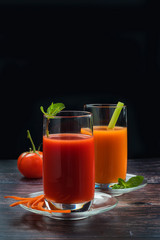 Homemade vegan green juice with vegetables, carrots, celery and tomatoes. Antioxidant drink