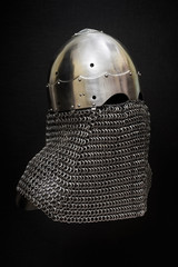 Knight helmet on black.