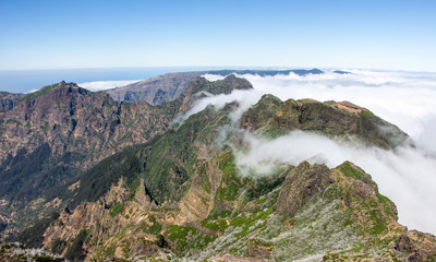 Madeira mountain landscape spectacular view clouds roller horizon blue sky outdoor traveling concept encumeada pass