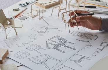 Designer sketching drawing design development product plan draft chair armchair Wingback Interior...