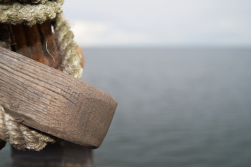 Wood pole on a ship overlooking sea