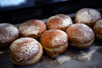 Beautiful fresh donuts. Beautifully decorated catering banquet table with sweets on corporate, christmas, birthday, party event or wedding celebration. 