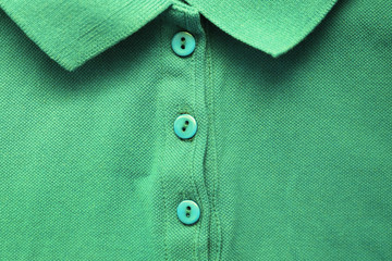 Colorful button-up polo shirt. Mint green t-shirt close up top view, casual clothes image. Simple...
