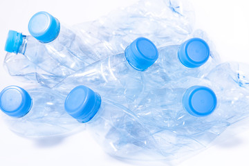 Bunch of disposable crumpled plastic bottles