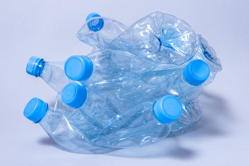 Bunch of disposable crumpled plastic bottles