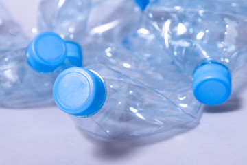 Bunch of disposable crumpled plastic bottles