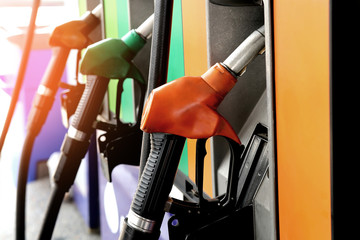 red green yellow orange color fuel gasoline dispenser  background energy