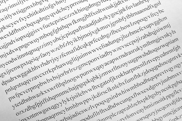 White sheet of paper with a cipher. The concept of cryptography and decryption. Encrypted text with...