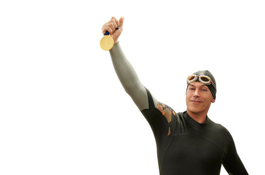 Isolated swimmer with olympic medal