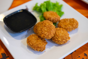 meatballs with sauce and mashed potatoes