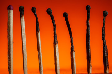 seven matches in a row in the corners of a leadership chart on a Lush Lava background. close up...