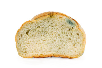 Mouldy bread on a white background. Expired pastries