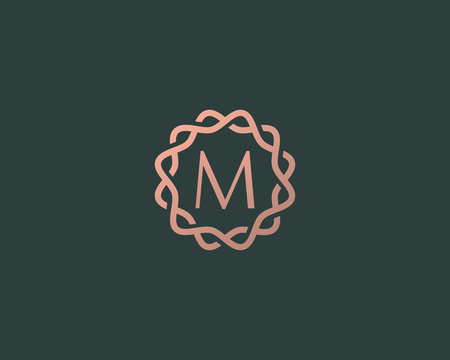 Abstract linear monogram letter M logo icon design modern minimal style illustration. Premium alphabet round wreath frame vector line emblem sign symbol mark logotype