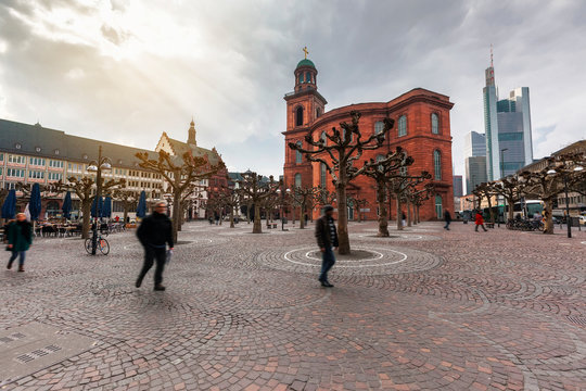 Paulplatz with a view of Paulskirche, famous Church in Frankfurt and skyscarpers against of dramatic sky, Germany